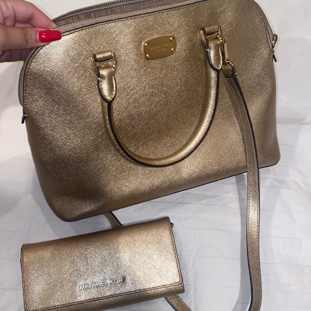 Golden Michael Kors purse and wallet